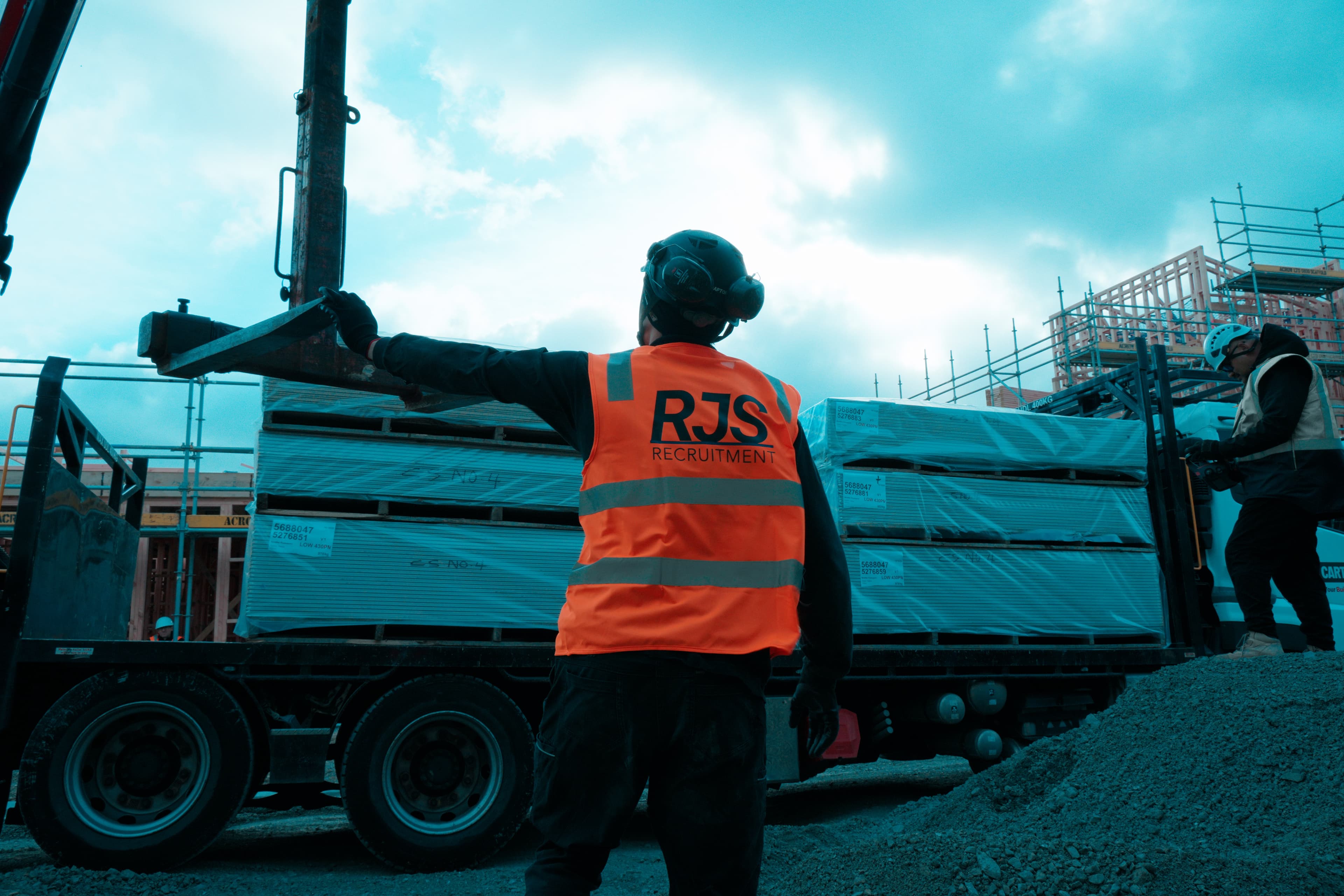 RJS Recruitment worker directing operations on site