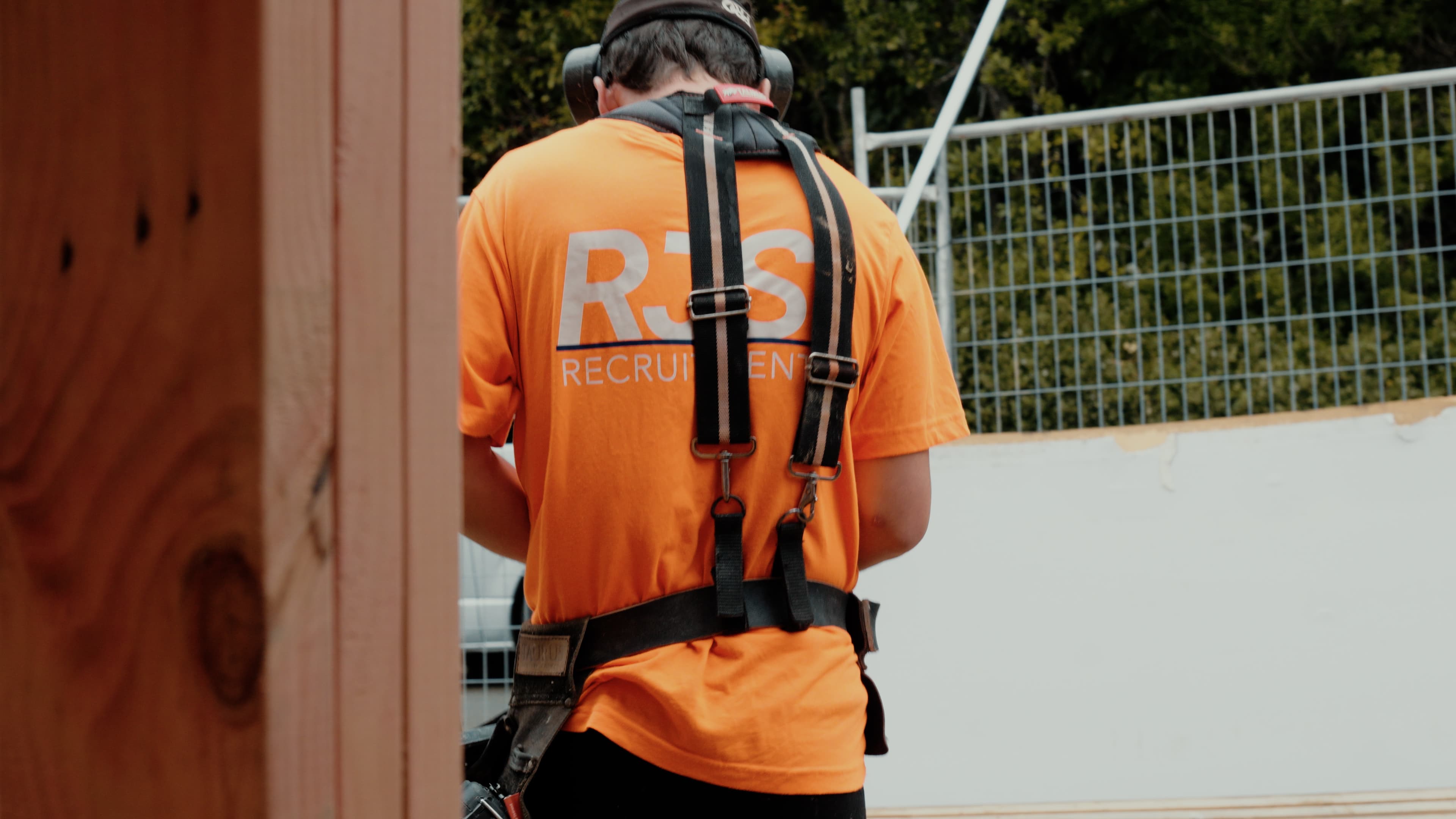 RJS Recruitment worker with safety harness on a building site